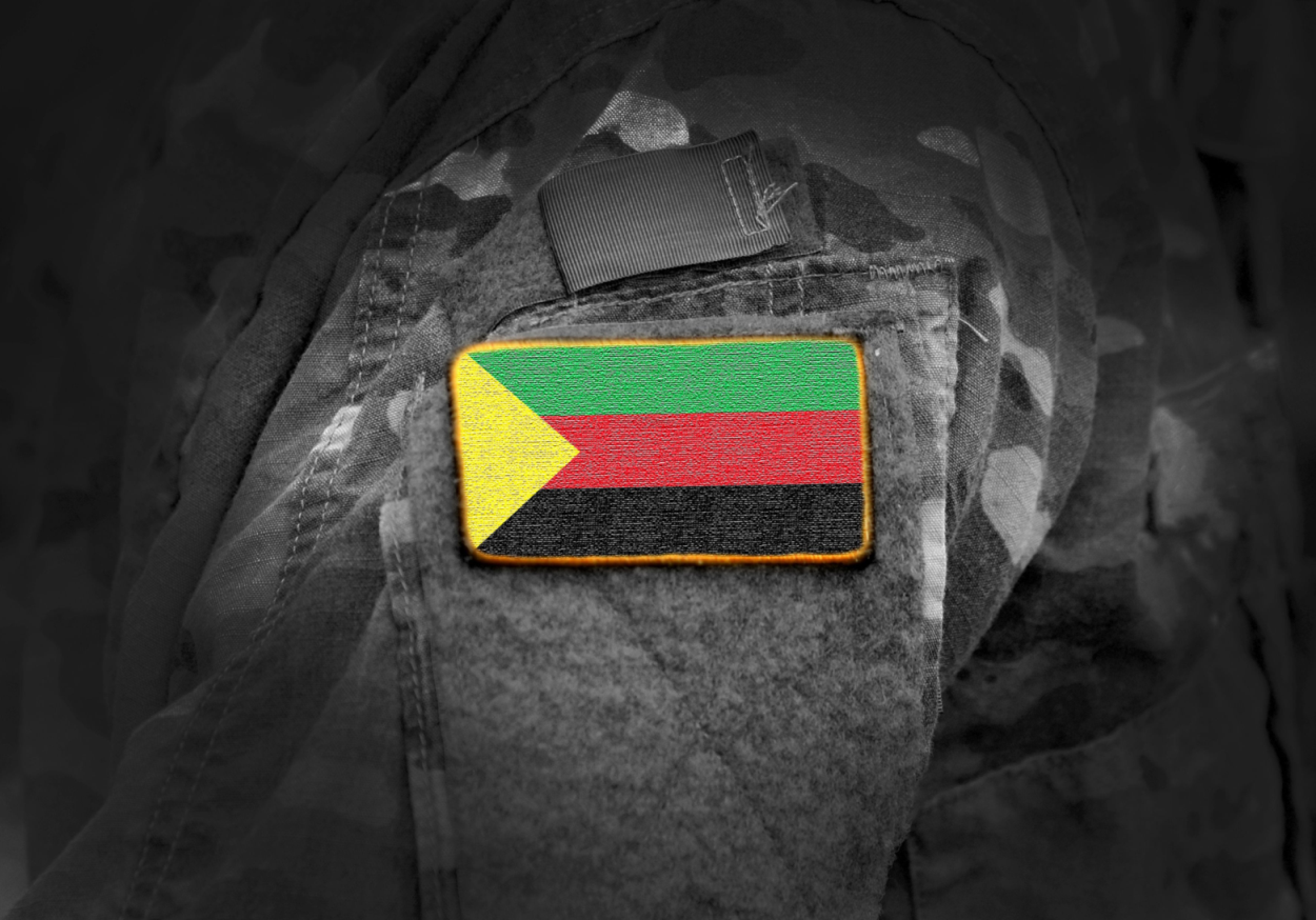 Flag of Azawad on soldiers arm. Flag of State of Azawad on military uniforms.