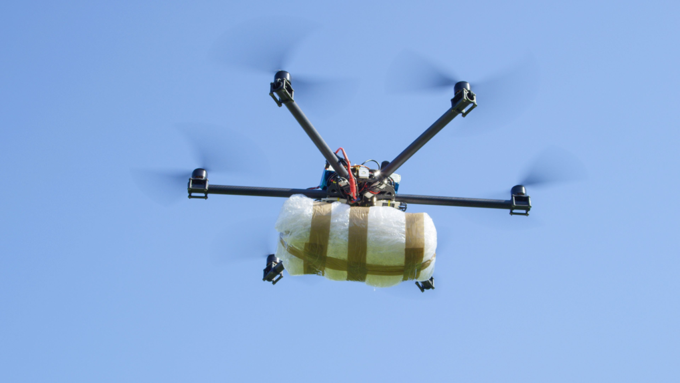 Illegal cargo drone flying big narco drugs package