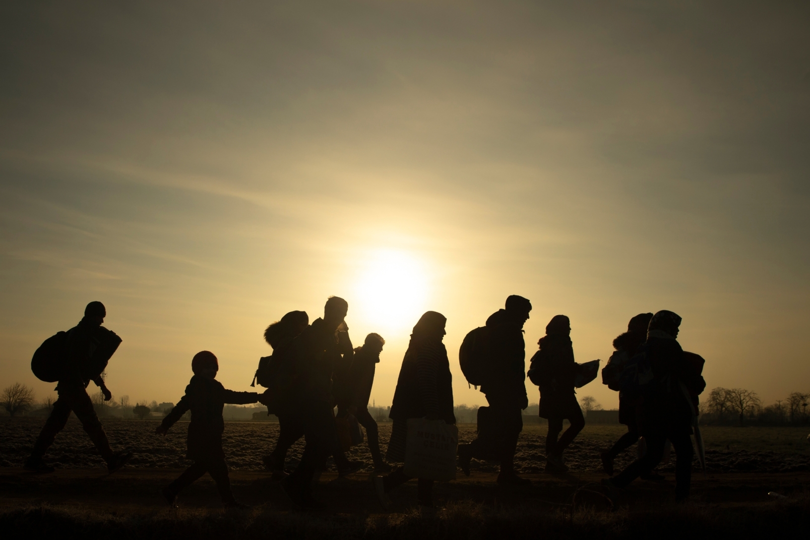 Migrants walk towards the Turkey's Pazarkule border crossing with Greece's Kastanies, in Edirne, Turkey March 1, 2020.