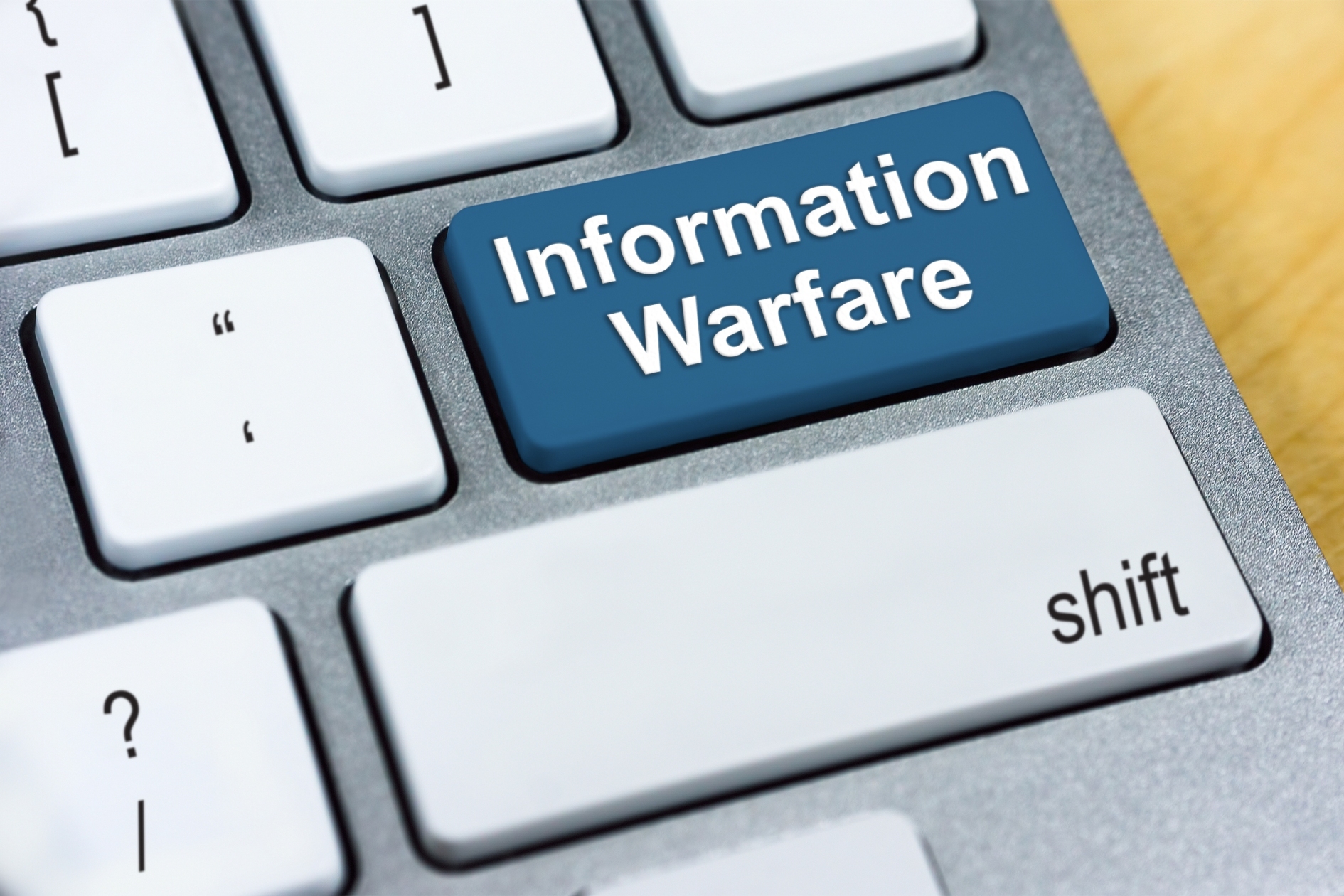 Keyboard with "Information Warfare" Button