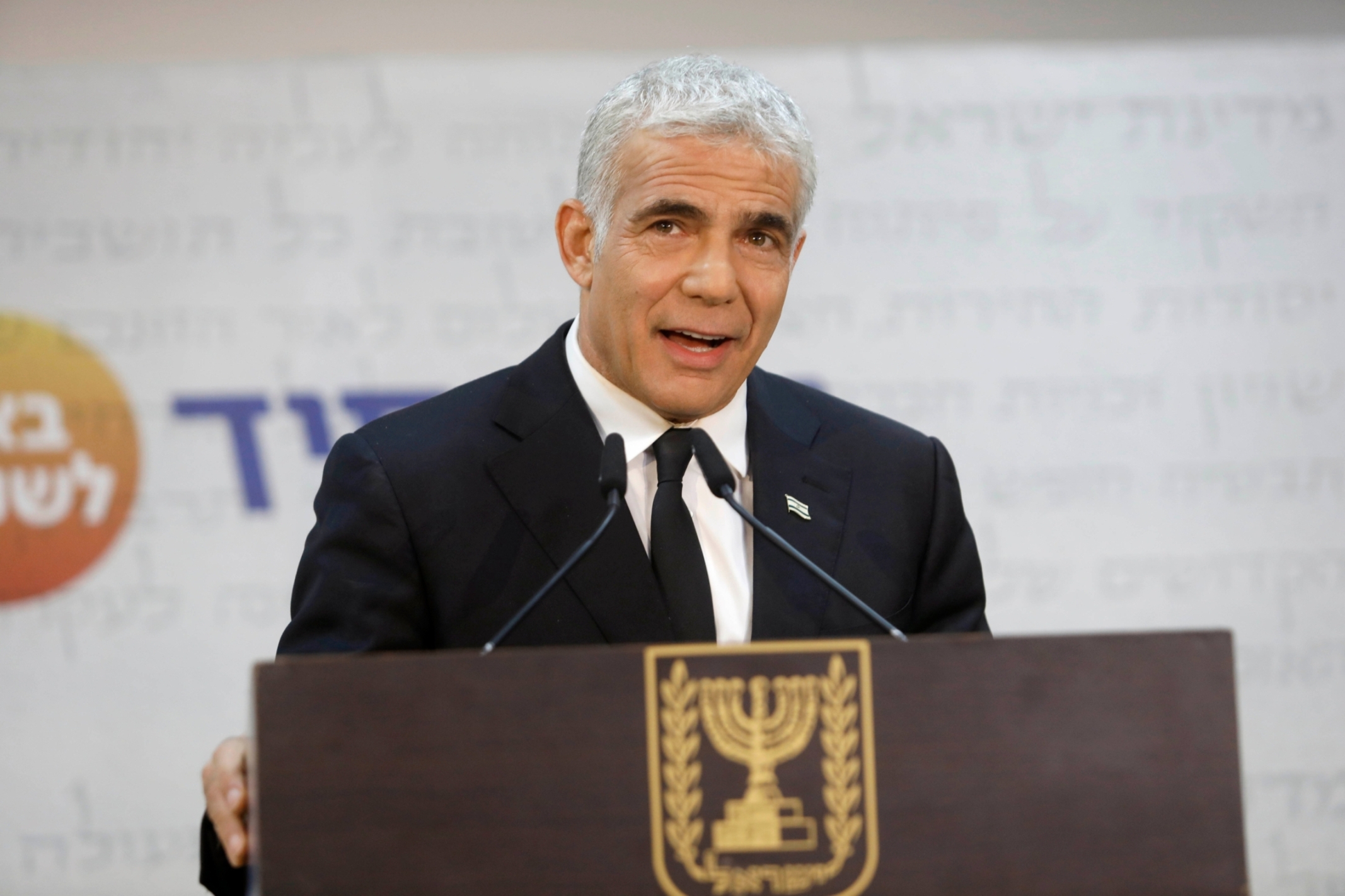 Yair Lapid the head of the Yesh Atid party speaks during a press conference in the Mediterranean coastal city of Tel Aviv on March 6, 2021.