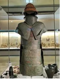 Dendra panoply, Mycenaean era, 1400 B.C.; https://grecorama.com/en/mycenaean-dendra-cemetery.